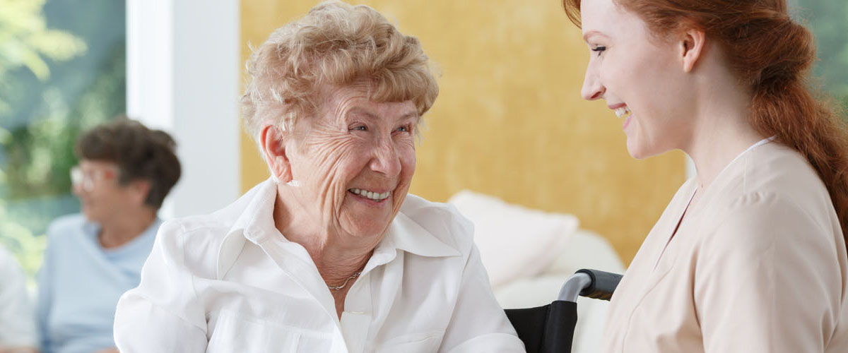 Happy woman at geriatric ward