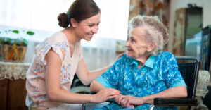 Professional Home Care Support Skills. Elderly lady being looked after in her home.